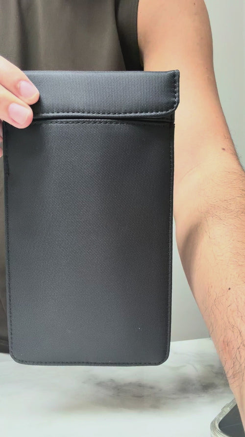 NullSignal product demo — sealing the Faraday pouch