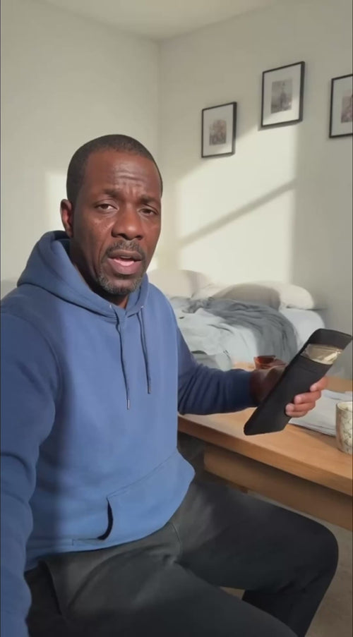 NullSignal customer testimonial video — man holding the signal-blocking pouch