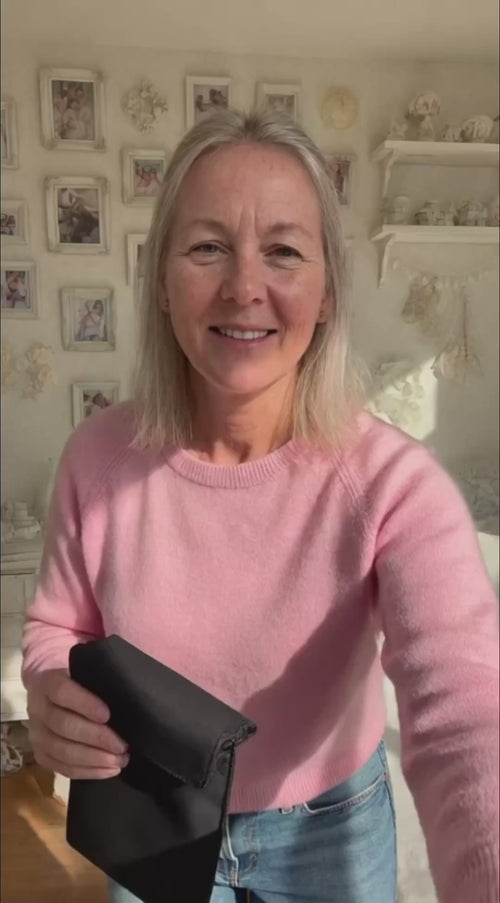 NullSignal customer testimonial video — woman showing the shielded lining